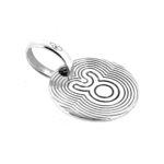Side view of sterling silver Taurus disc charm.