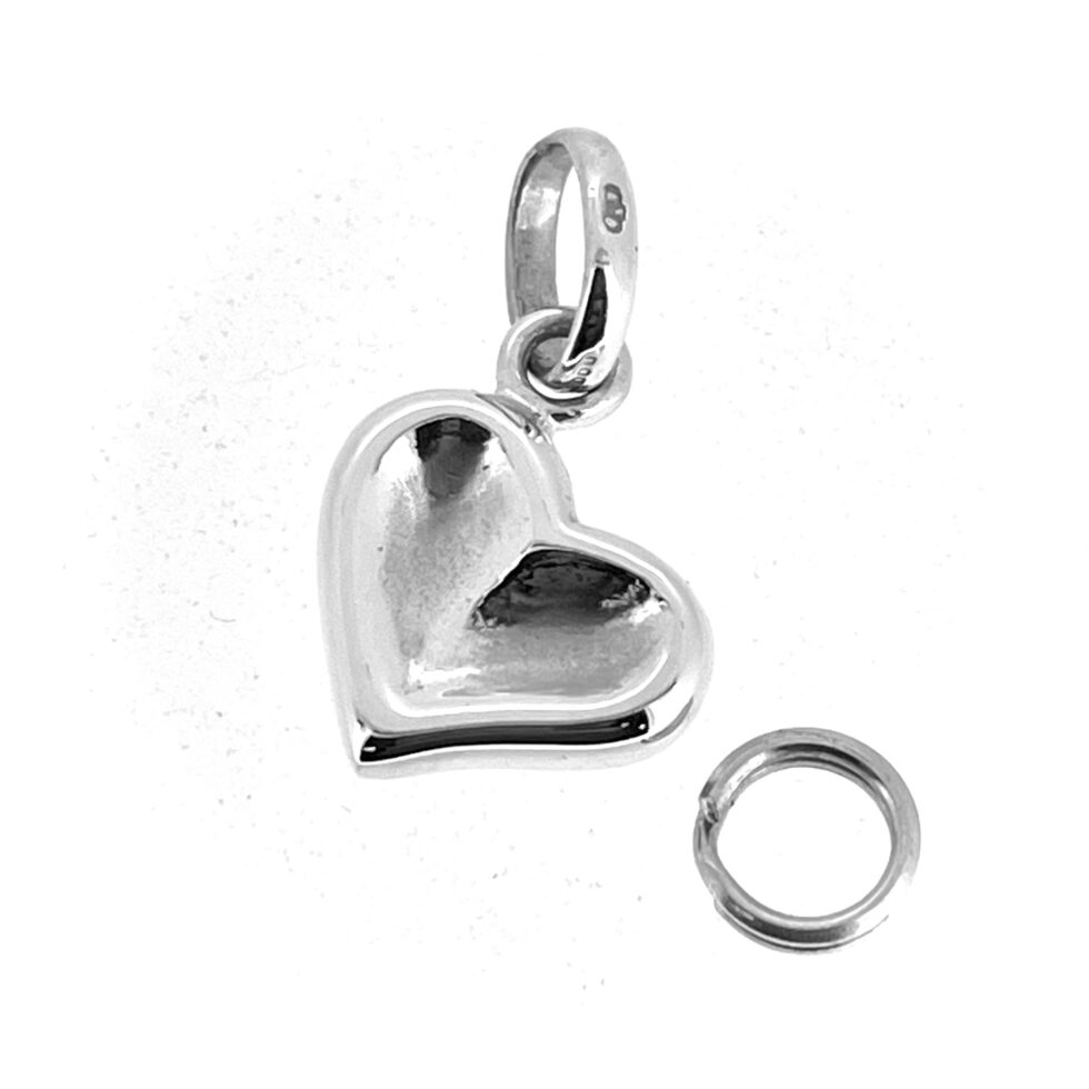 Sterling silver thumbprint heart charm with angled profile and oval Links of London bail