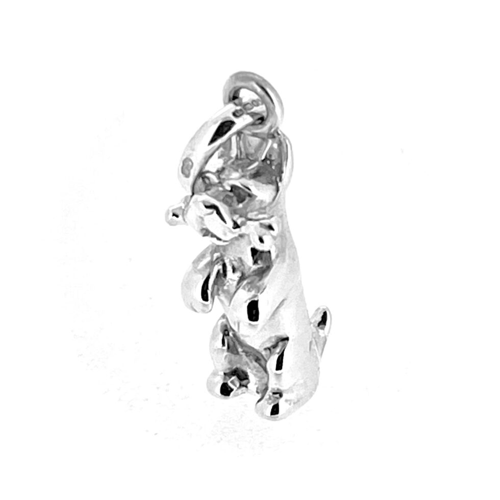 Detailed view of Links of London dog charm with raised paws