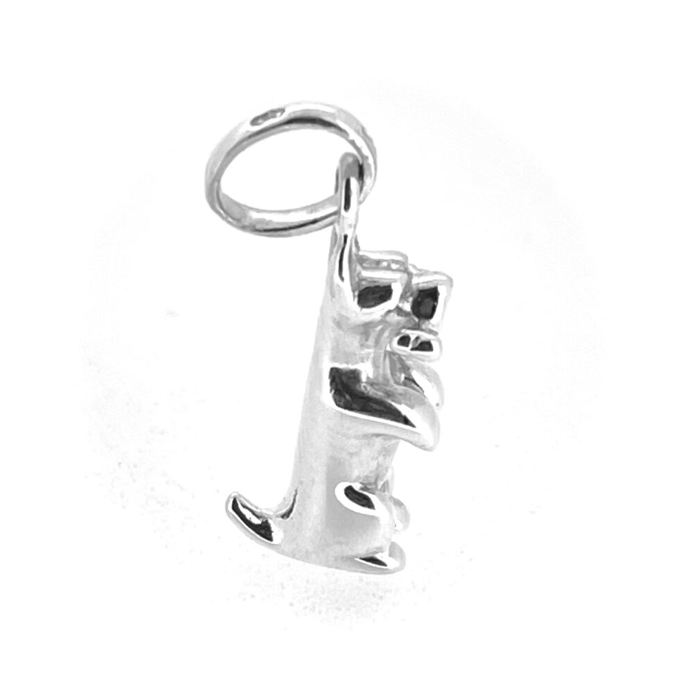 Side profile of vintage Links of London dog with bone charm