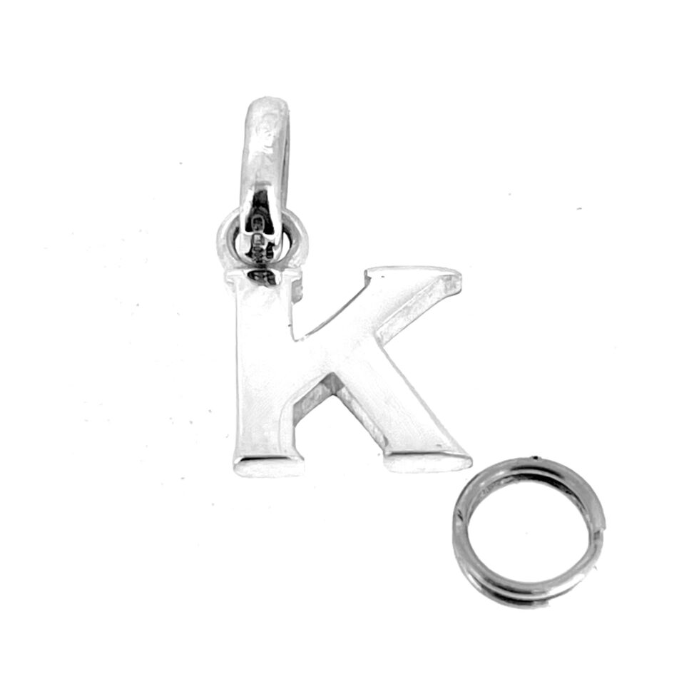 Links of London K initial charm showing classic sculpted serif design