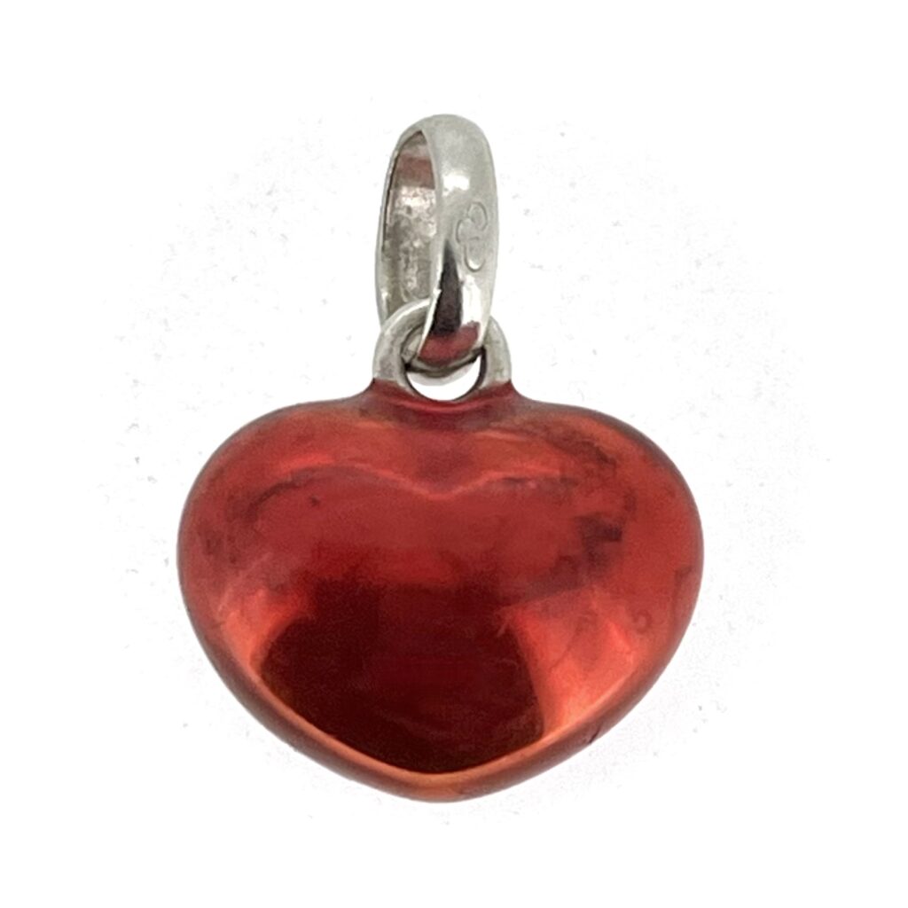 Domed heart charm in sterling silver with translucent red enamel finish