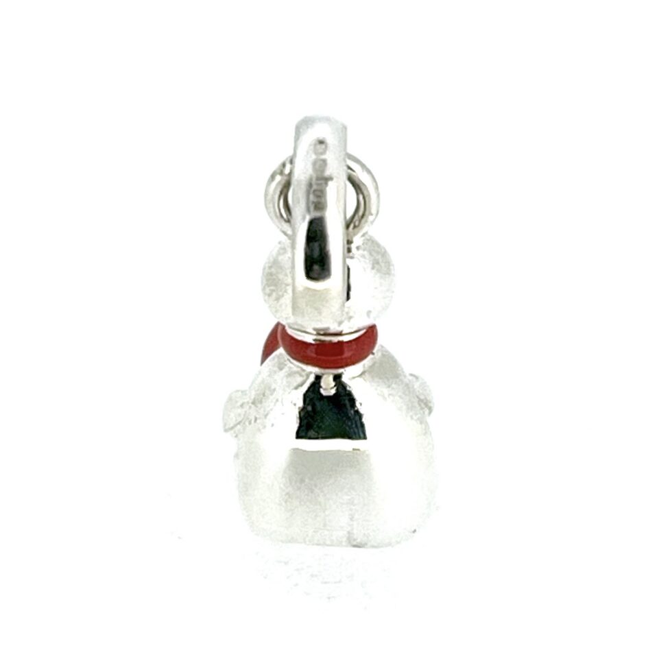 Used vintage snowman charm showing enamel wear