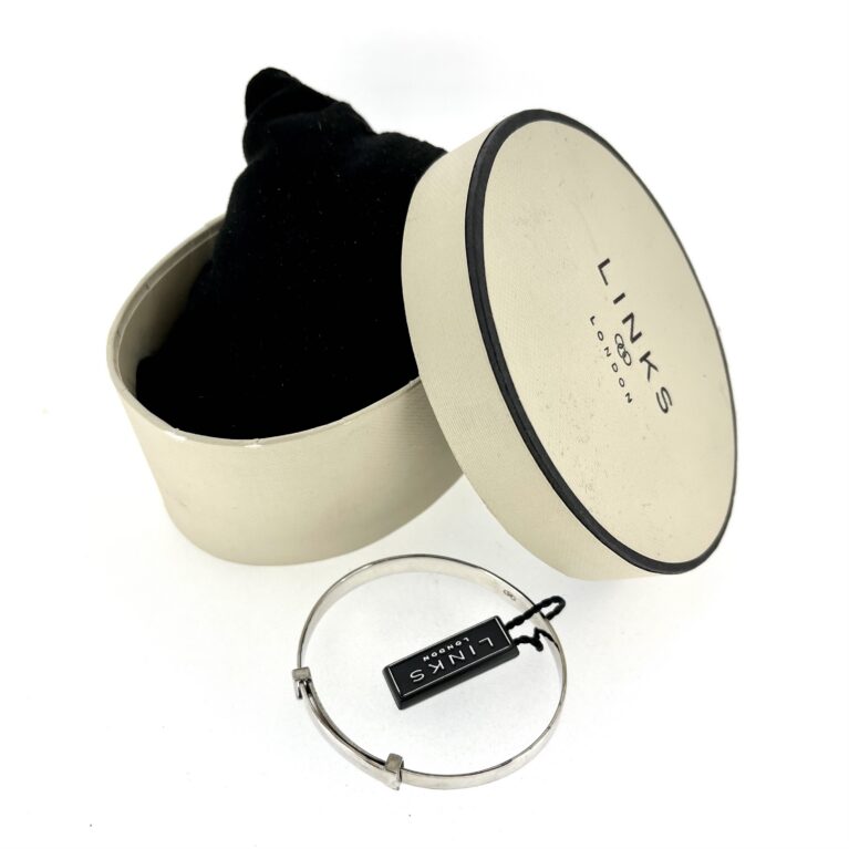 New old stock silver baby bangle with original packaging