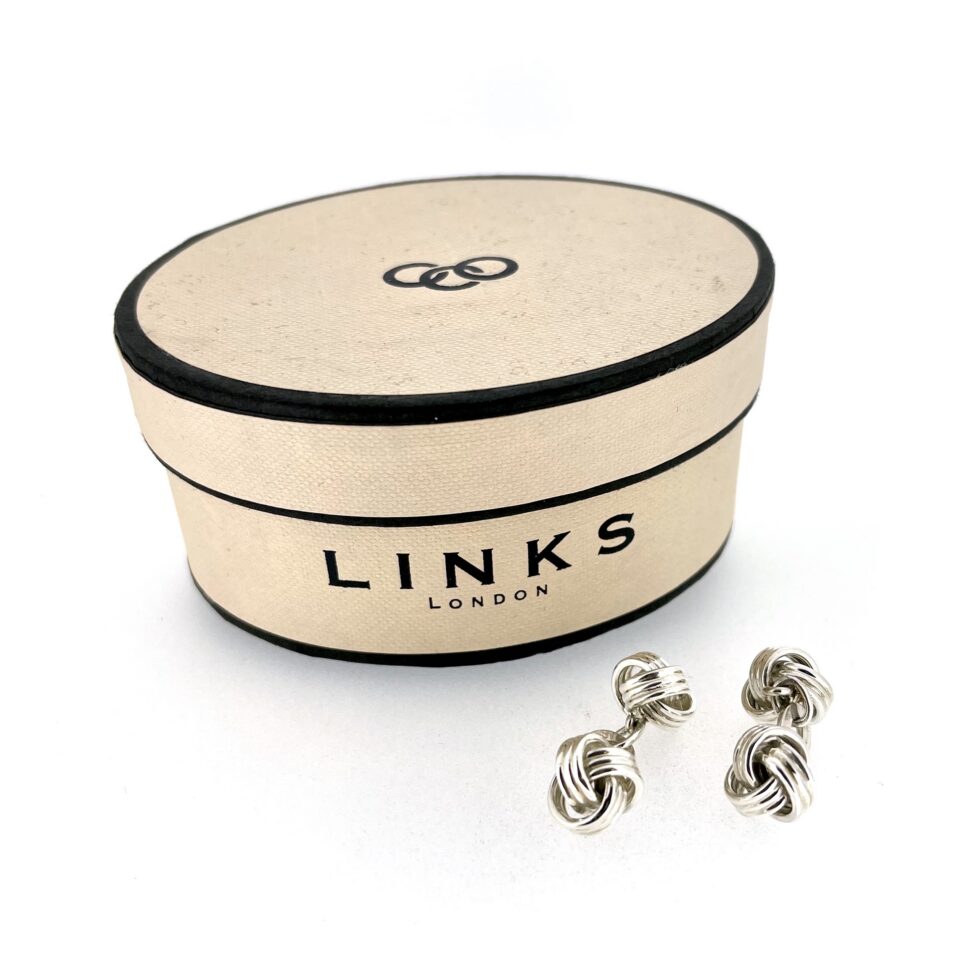 Chain-connected knot cufflinks detail