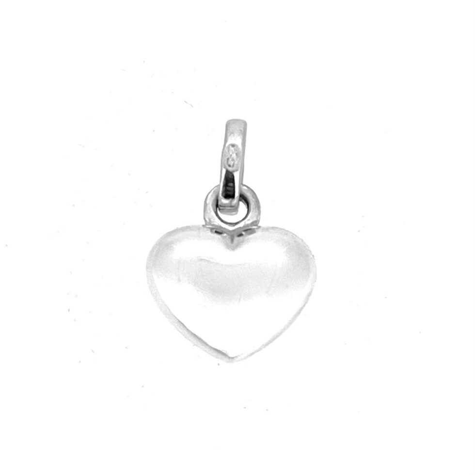 Small sterling silver heart charm close up