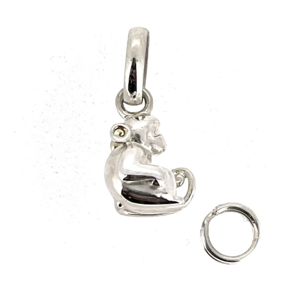 Sterling silver seated monkey charm with gold ears