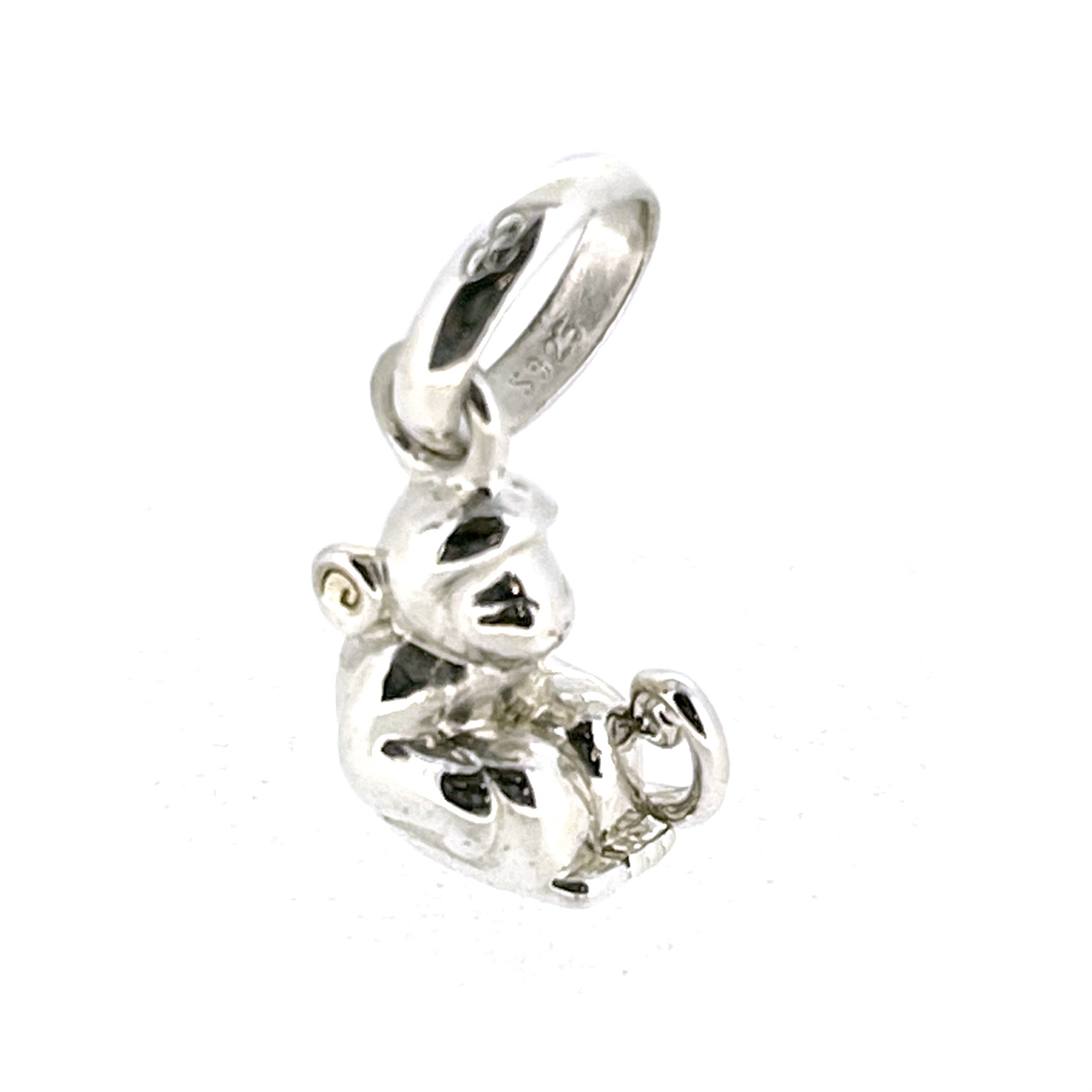 Miniature monkey charm with curled tail