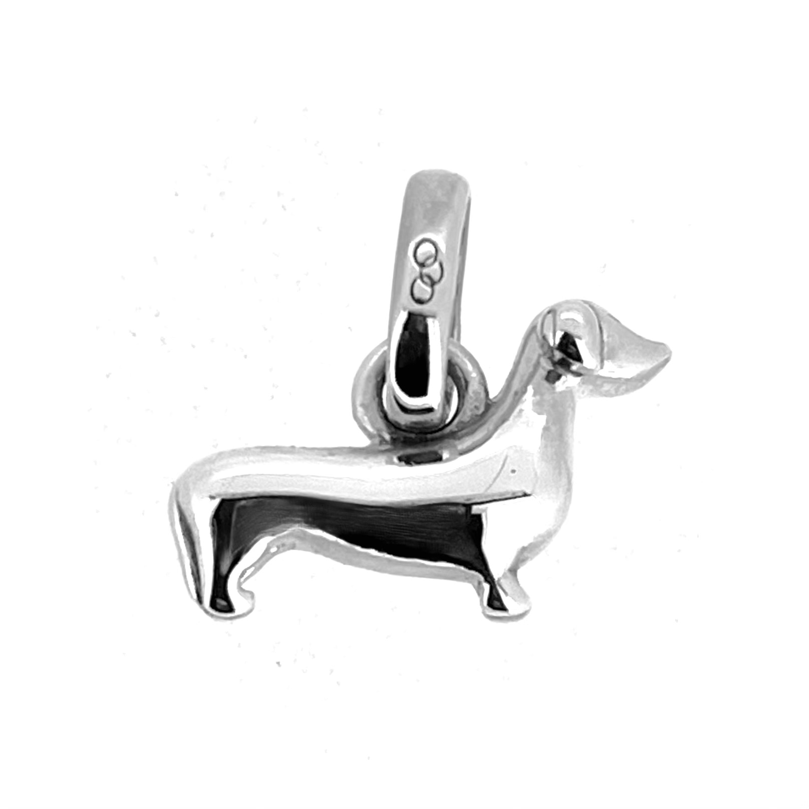 Side profile of sterling silver dachshund charm showing long body proportions
