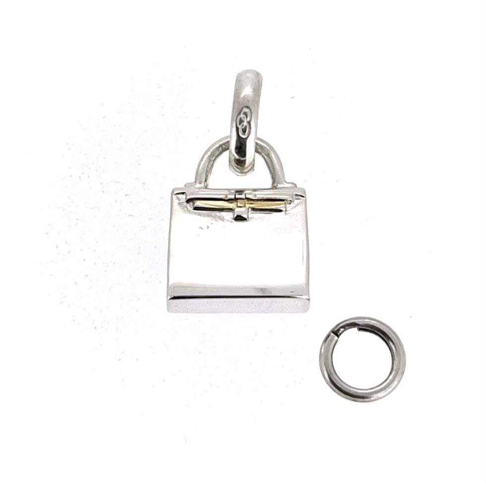 Structured rectangular handbag charm with horizontal strap detail