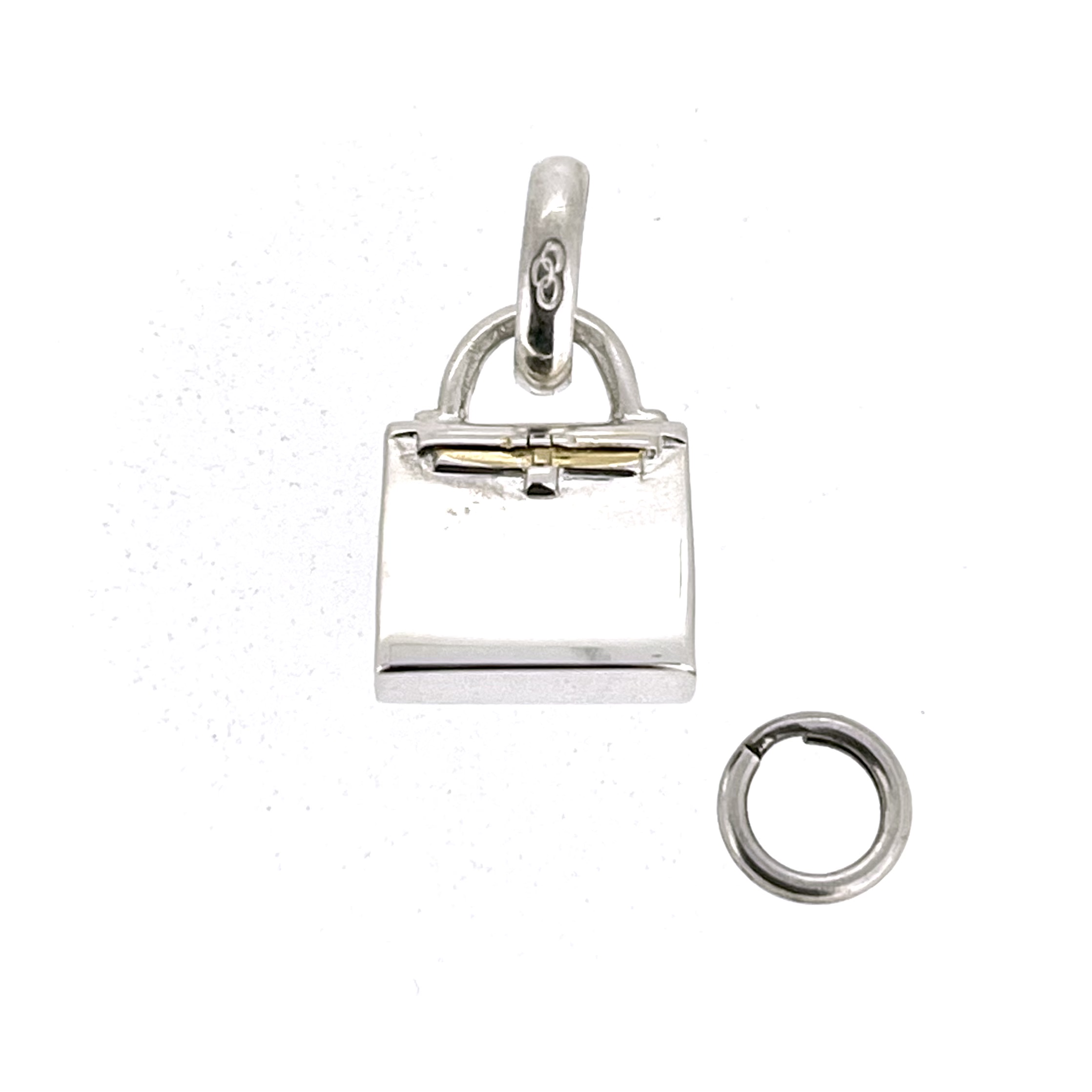 Structured rectangular handbag charm with horizontal strap detail