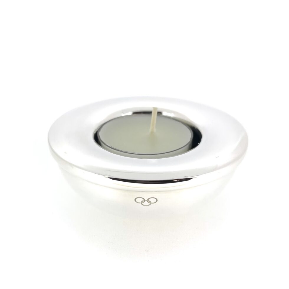 Engraved three ring logo on silver tealight holder