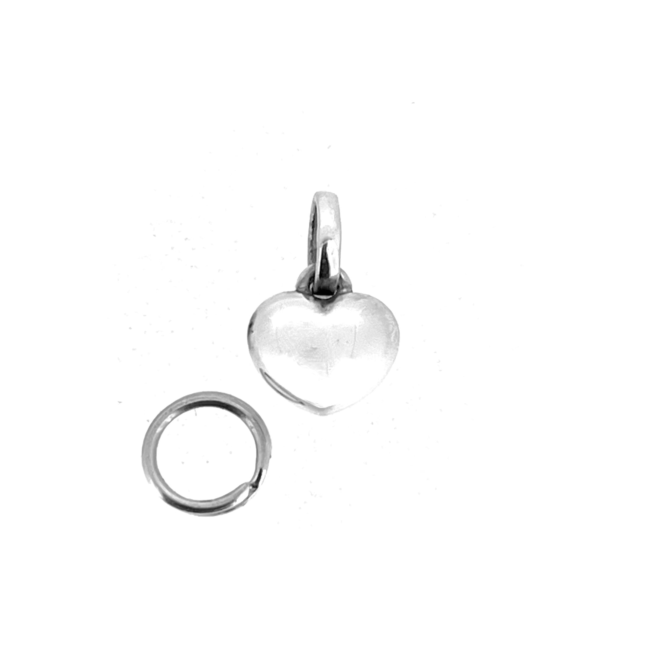 Polished sterling silver micro heart charm