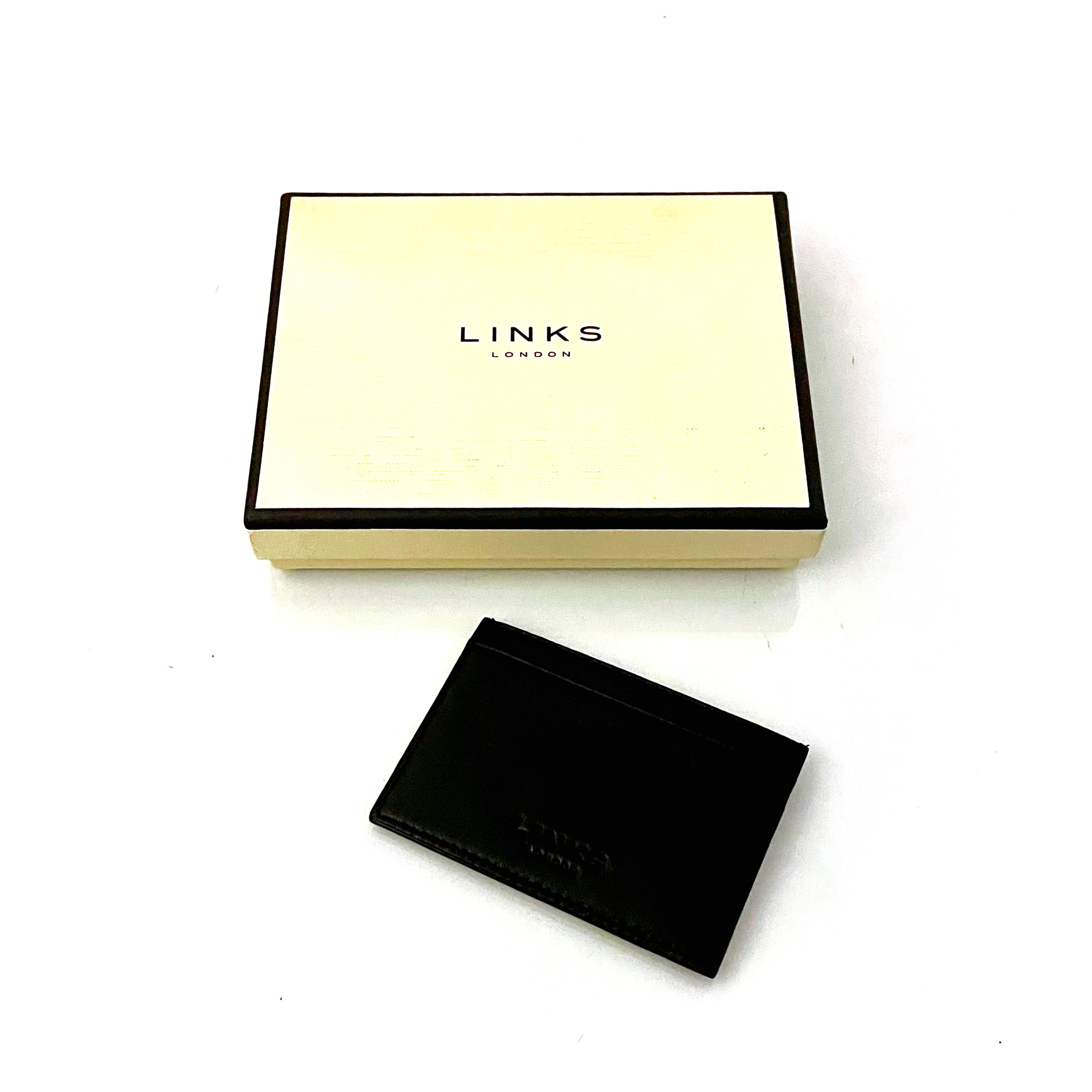 Black leather credit card holder with subtle embossed Links London logo