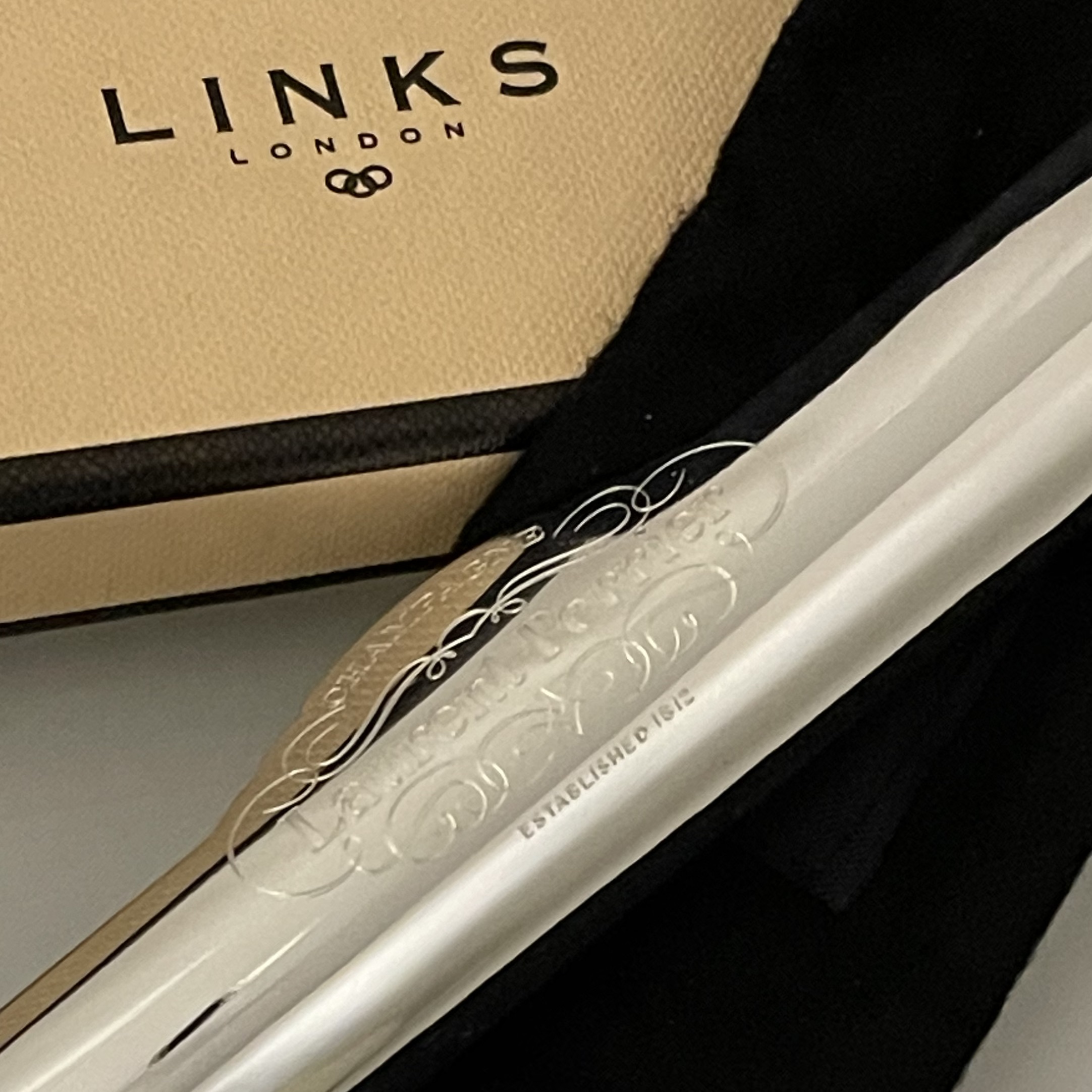 Laurent Perrier engraved dining table tool