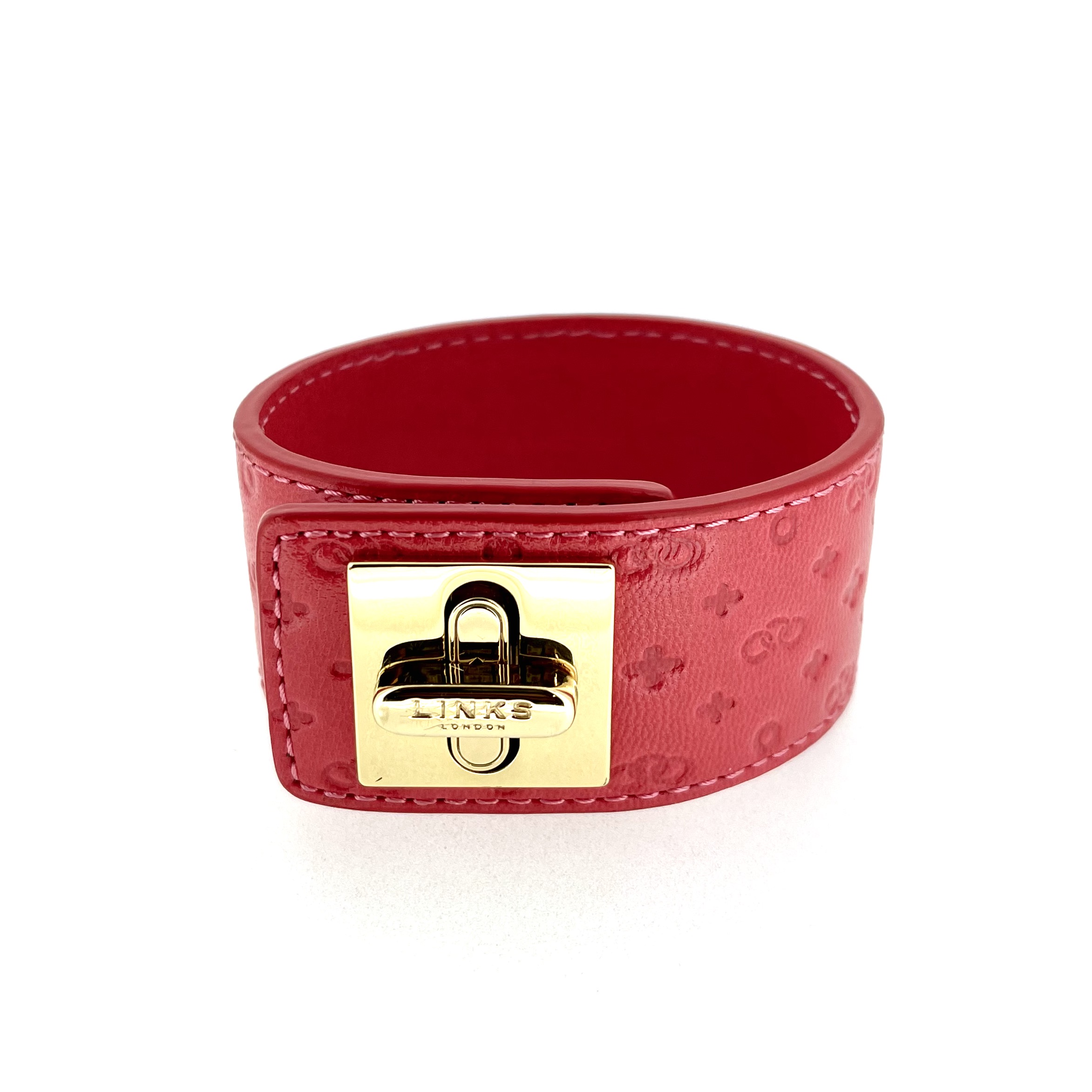 Embossed Links logo pattern leather cuff texture