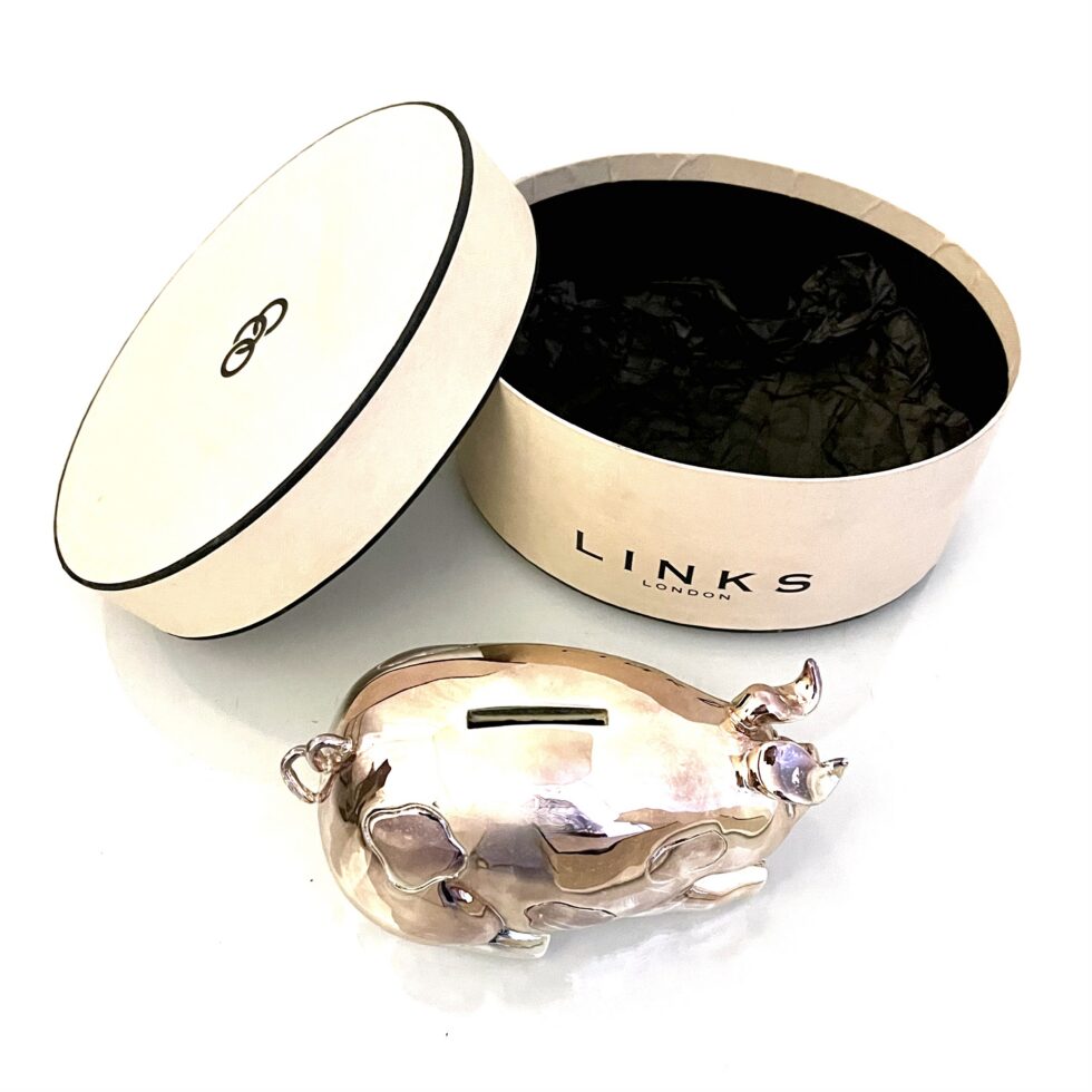 Vintage silver plated piggy bank textured surface