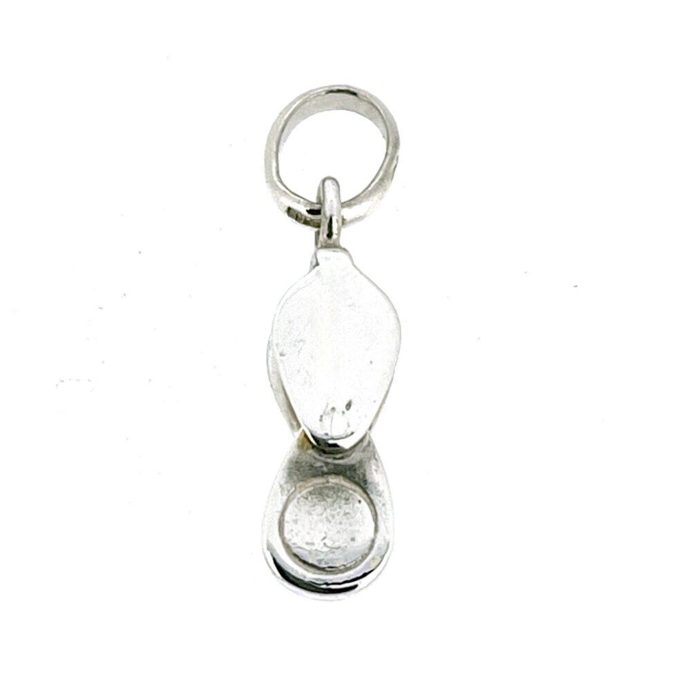 Vintage silver loupe charm open position