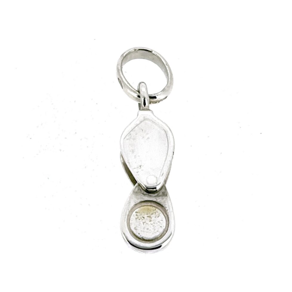 Hinged jeweller’s loupe charm in sterling silver