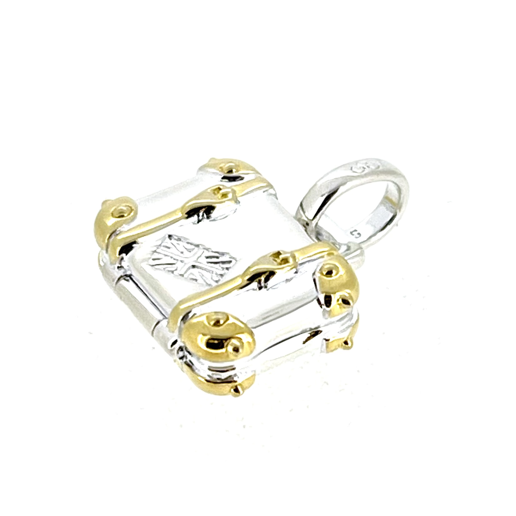 Miniature suitcase charm open showing engraved message interior