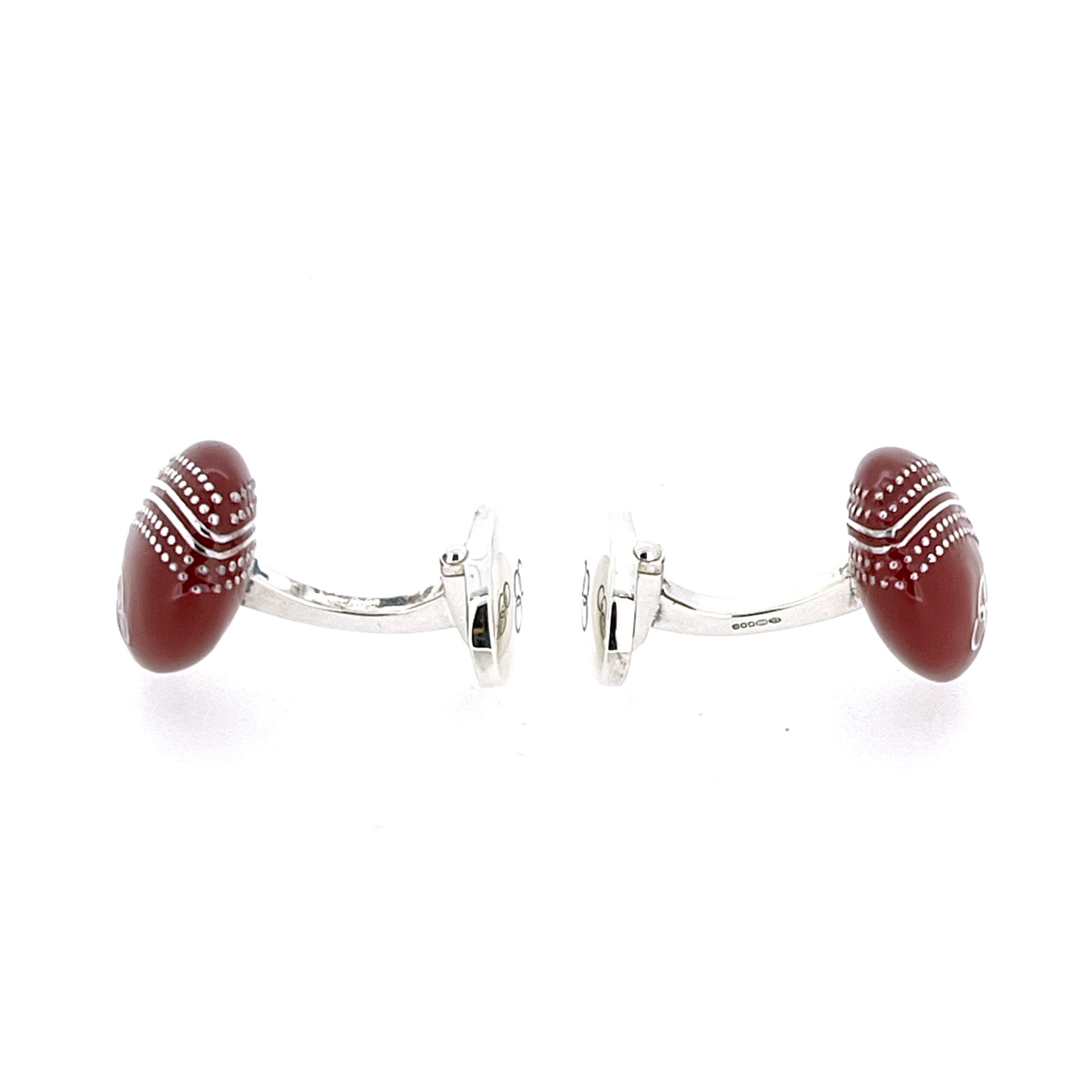 Side profile of enamel cricket ball cufflinks