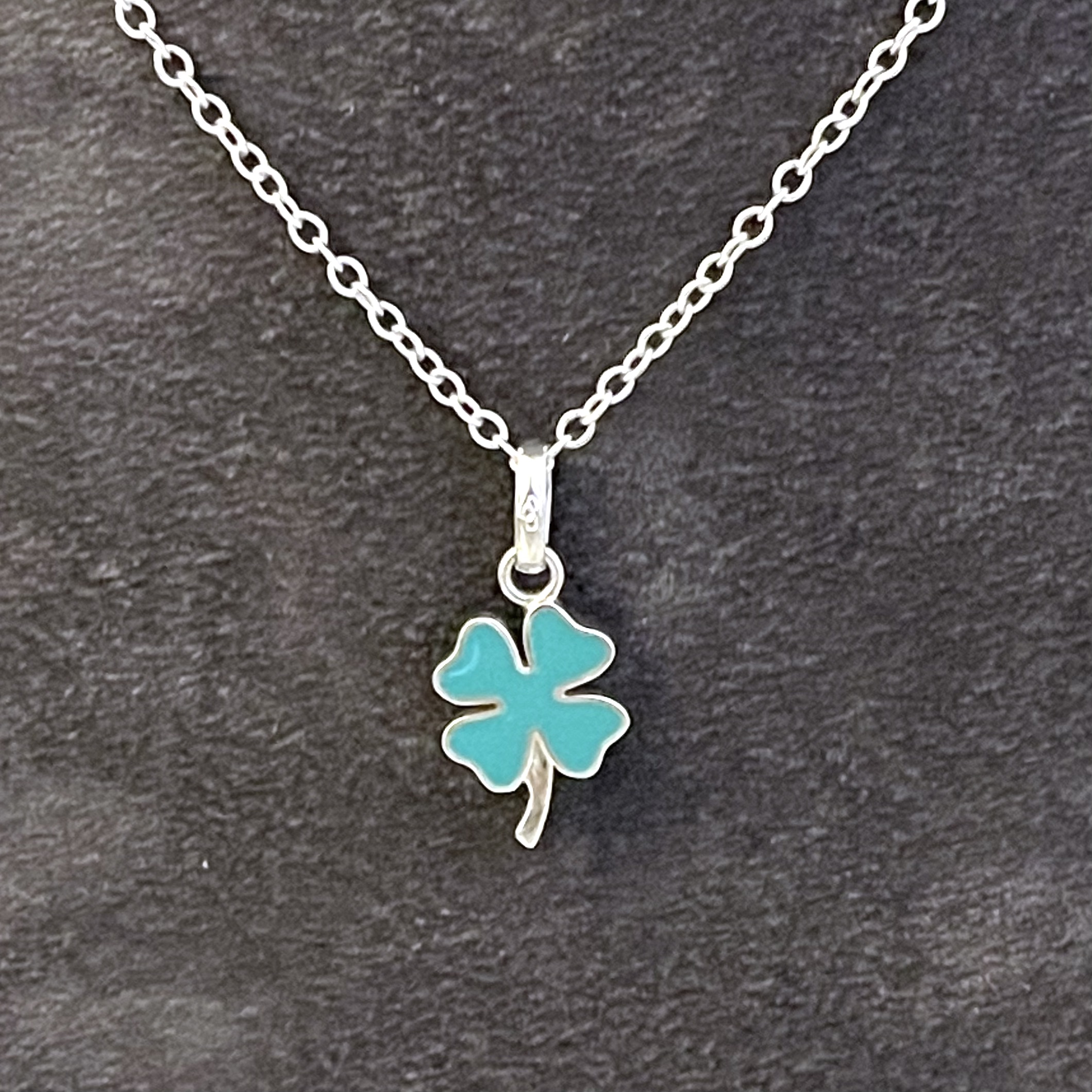 Green enamel clover necklace in sterling silver front view