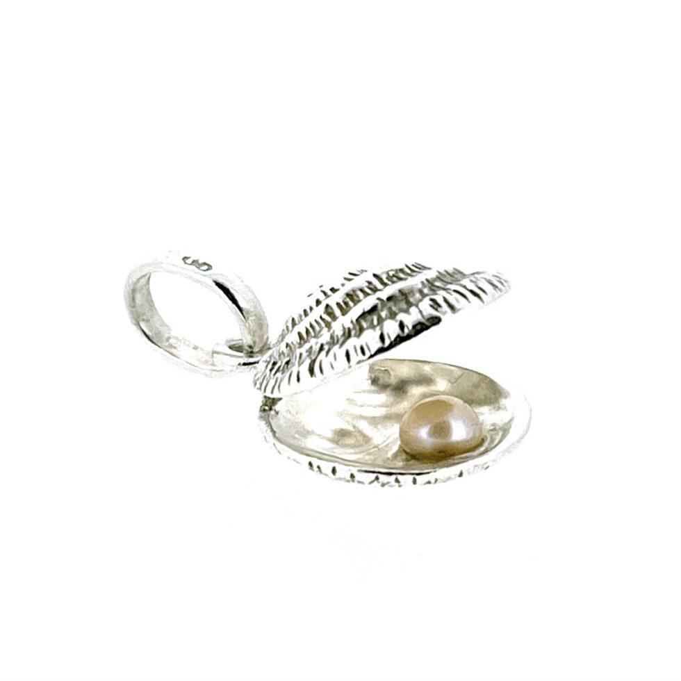 Links of London oyster shell charm open with pearl inside