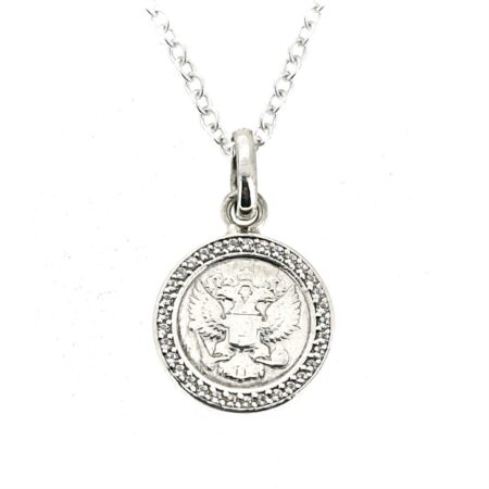 Coin-style charm presented as a finished sterling silver necklace
