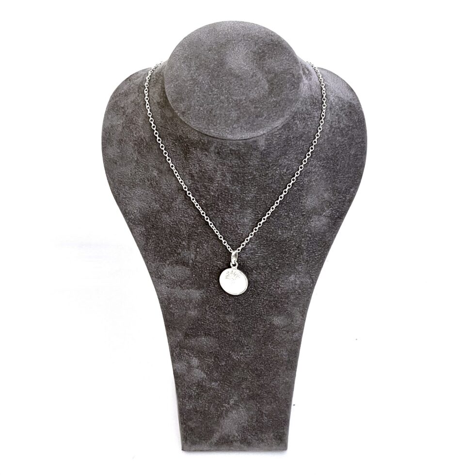 White topaz framed coin necklace by Links of London front view