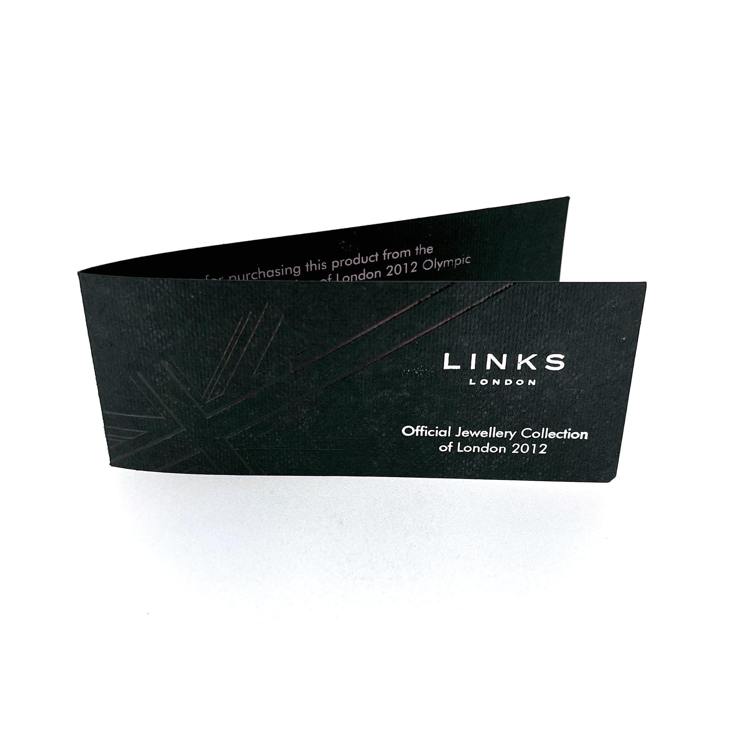 Side profile of silver plated yo-yo showing thickness