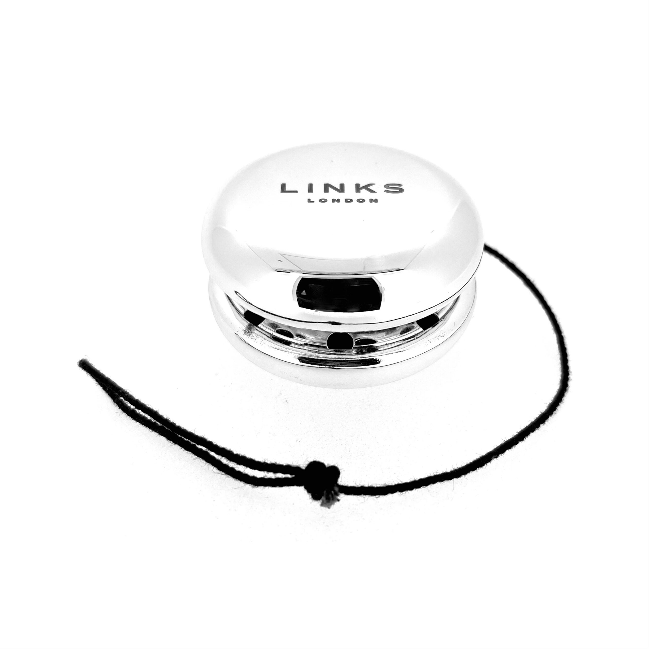 Close up of engraved Links London logo on yo-yo