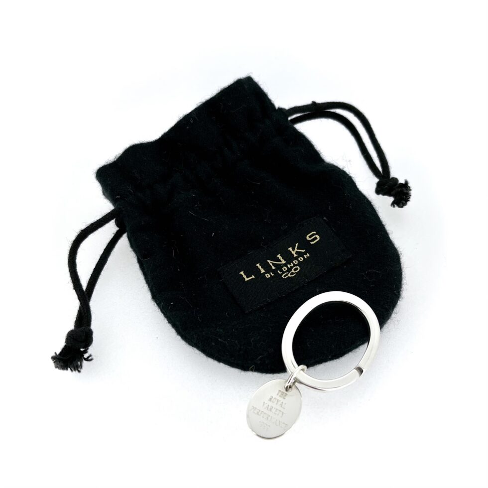 Links of London silver keyring displayed with original black gift pouch