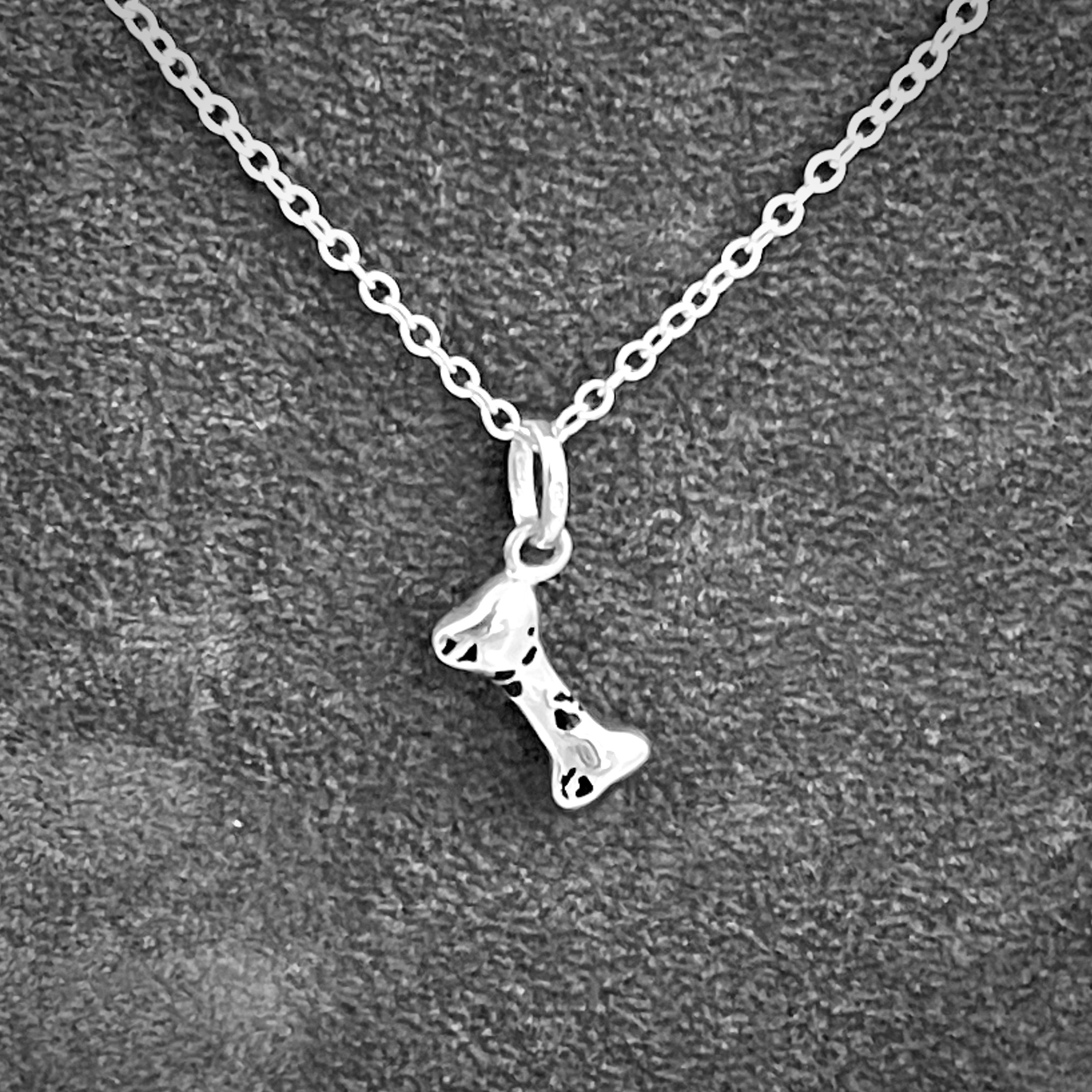 Dog bone charm presented as a finished Links of London necklace