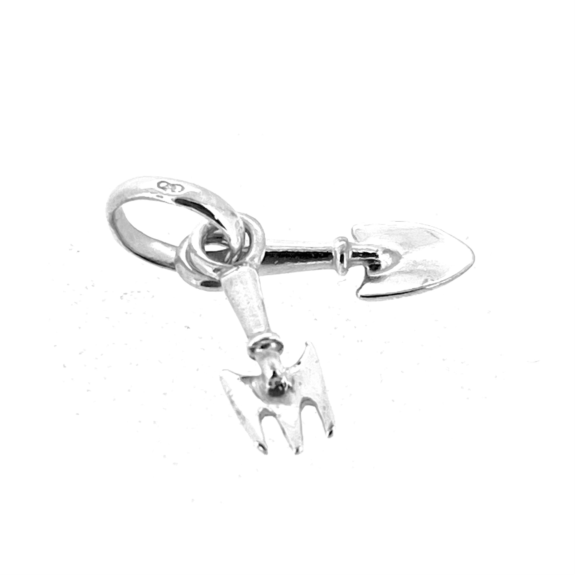 Side angle of sterling silver gardening charm with two miniature tools