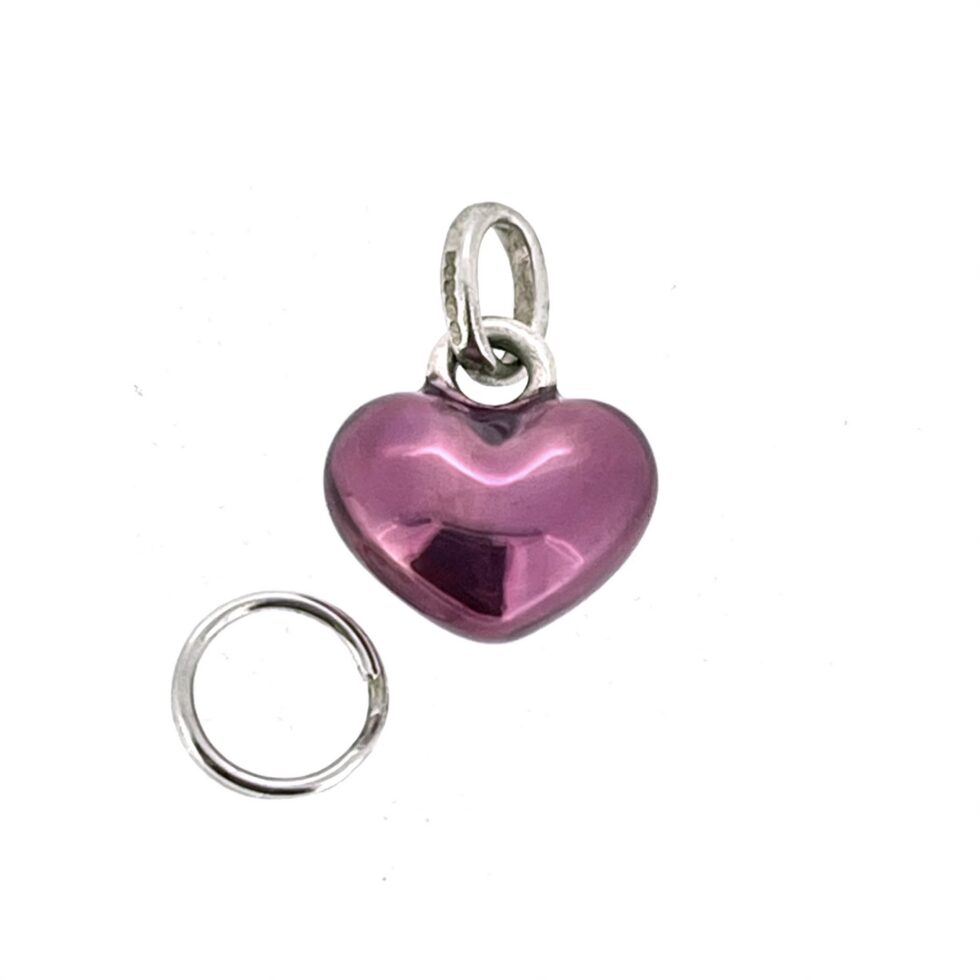 Close view of translucent purple enamel on Links of London mini heart charm