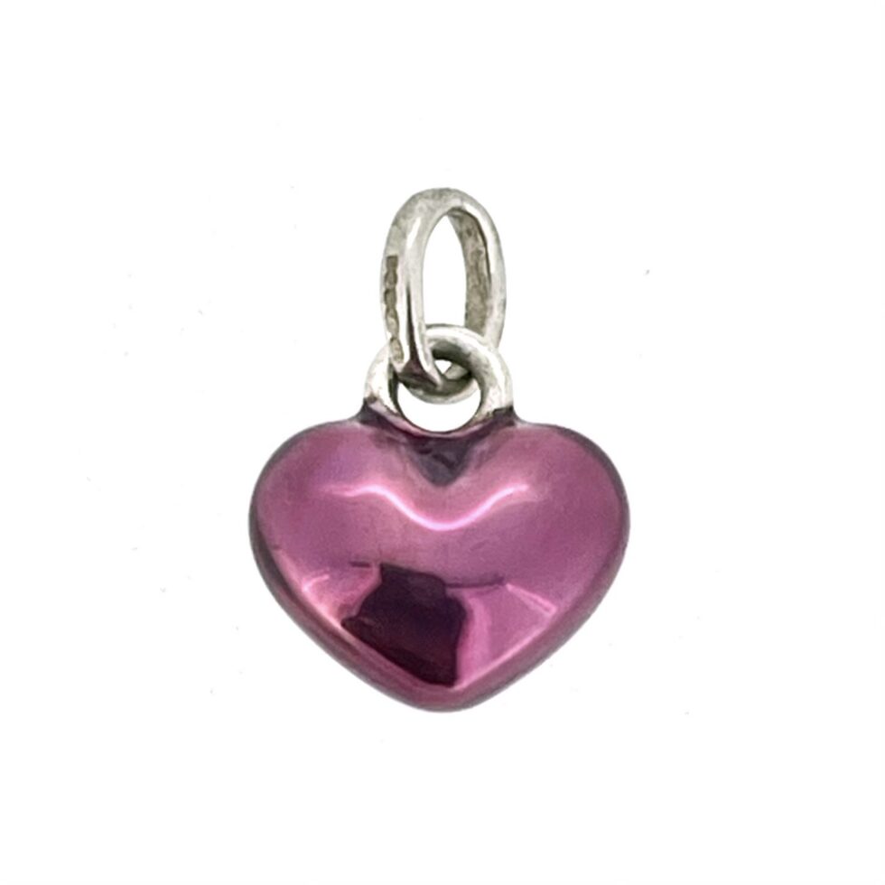 Vintage mini puffed heart charm showing rounded heart shape and purple finish