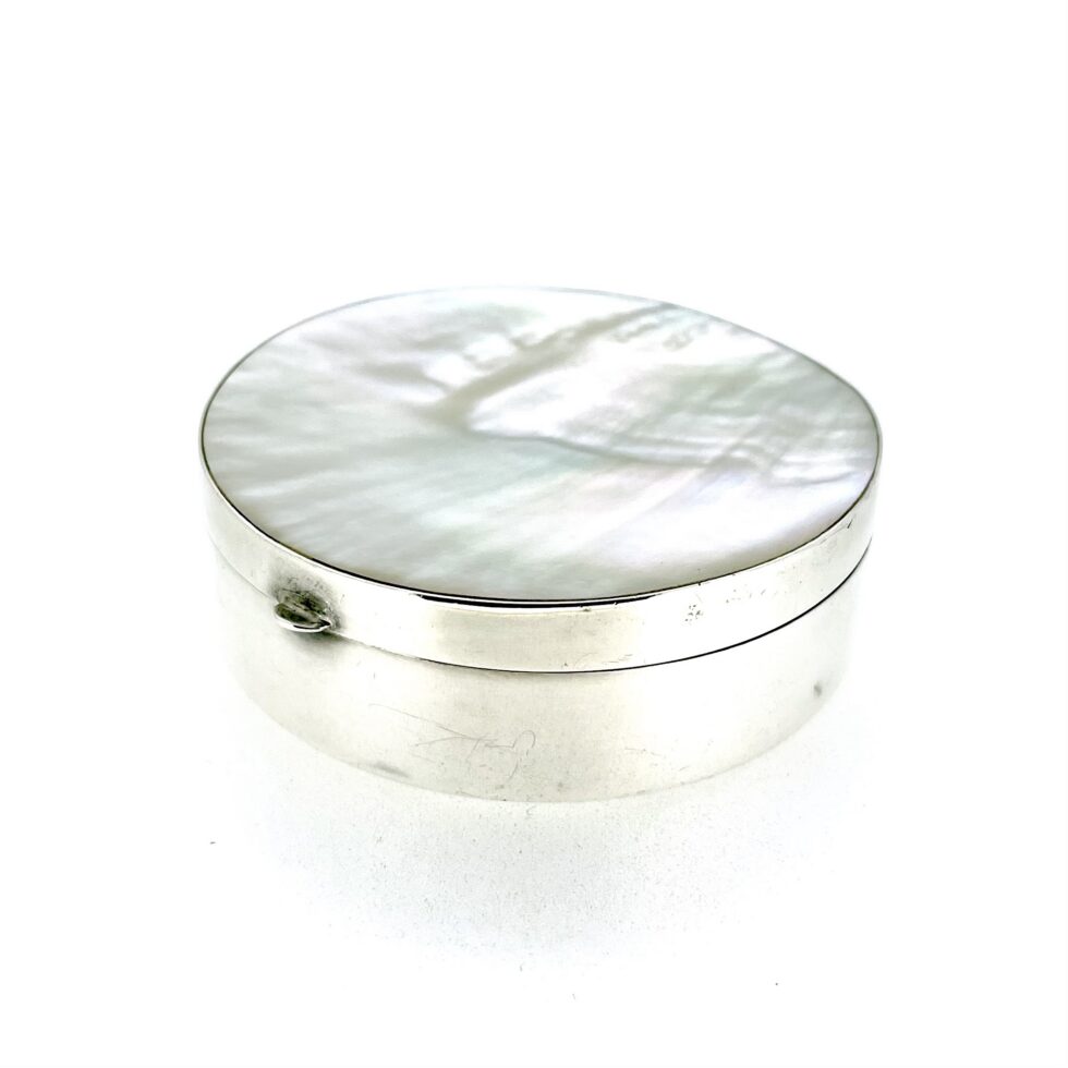 Closed vintage Links of London round trinket box with iridescent lid