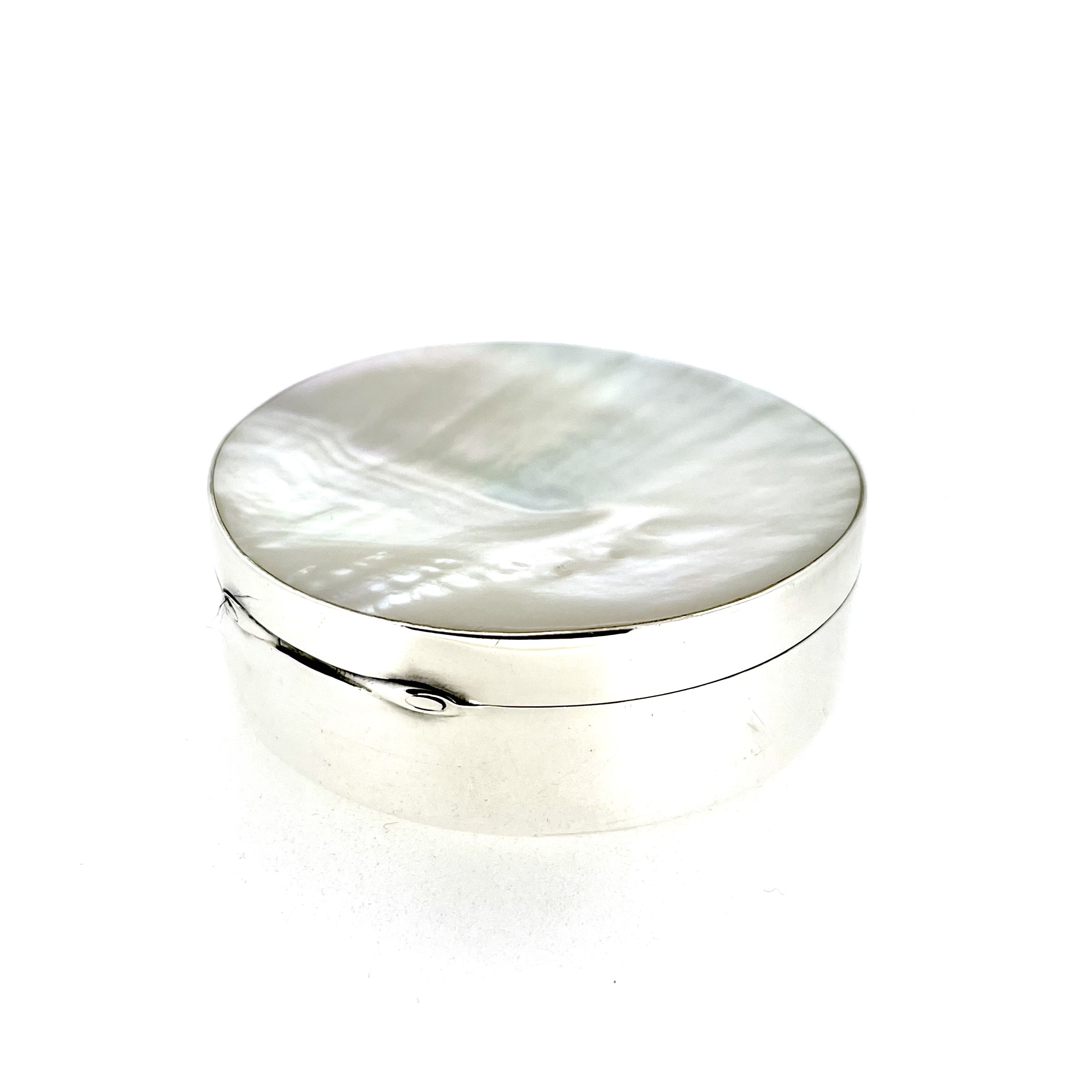 Vintage sterling silver trinket box with concave mother-of-pearl top