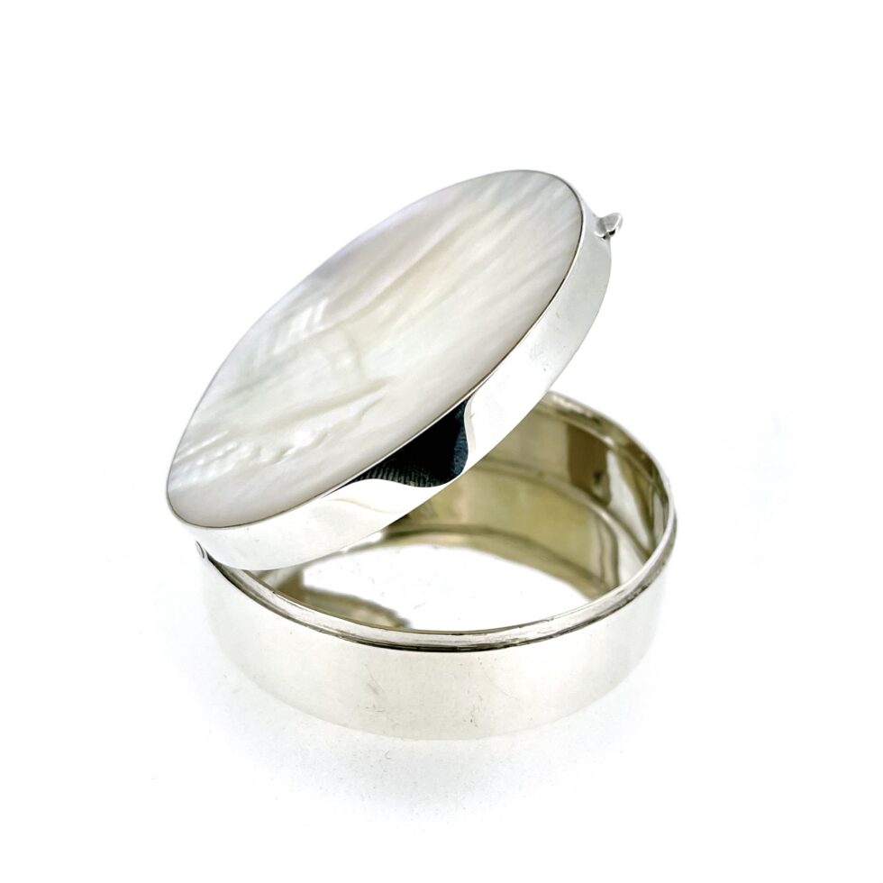 Side profile of Links of London trinket box showing low hinged opening