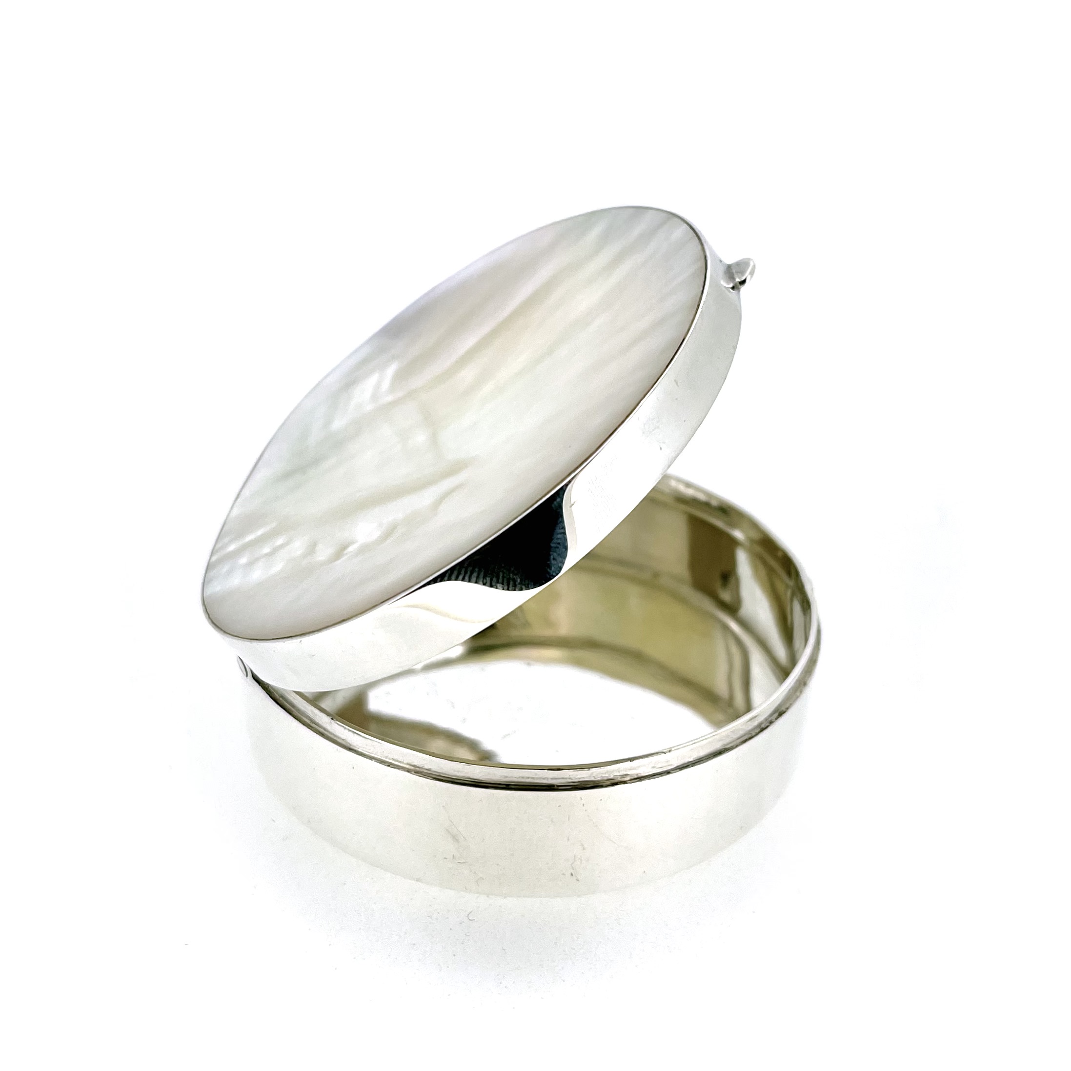 Side profile of Links of London trinket box showing low hinged opening