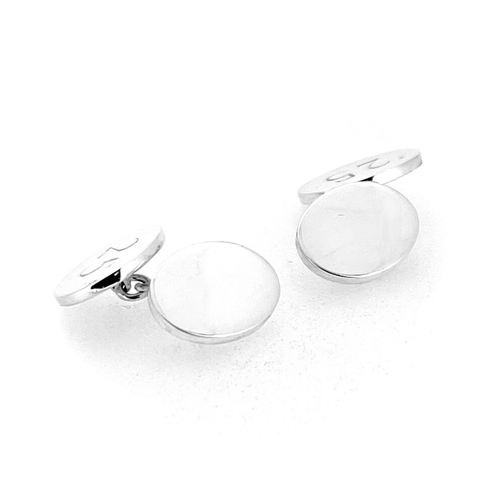 Reversible Links of London silver cufflinks showing polished and engraved sides