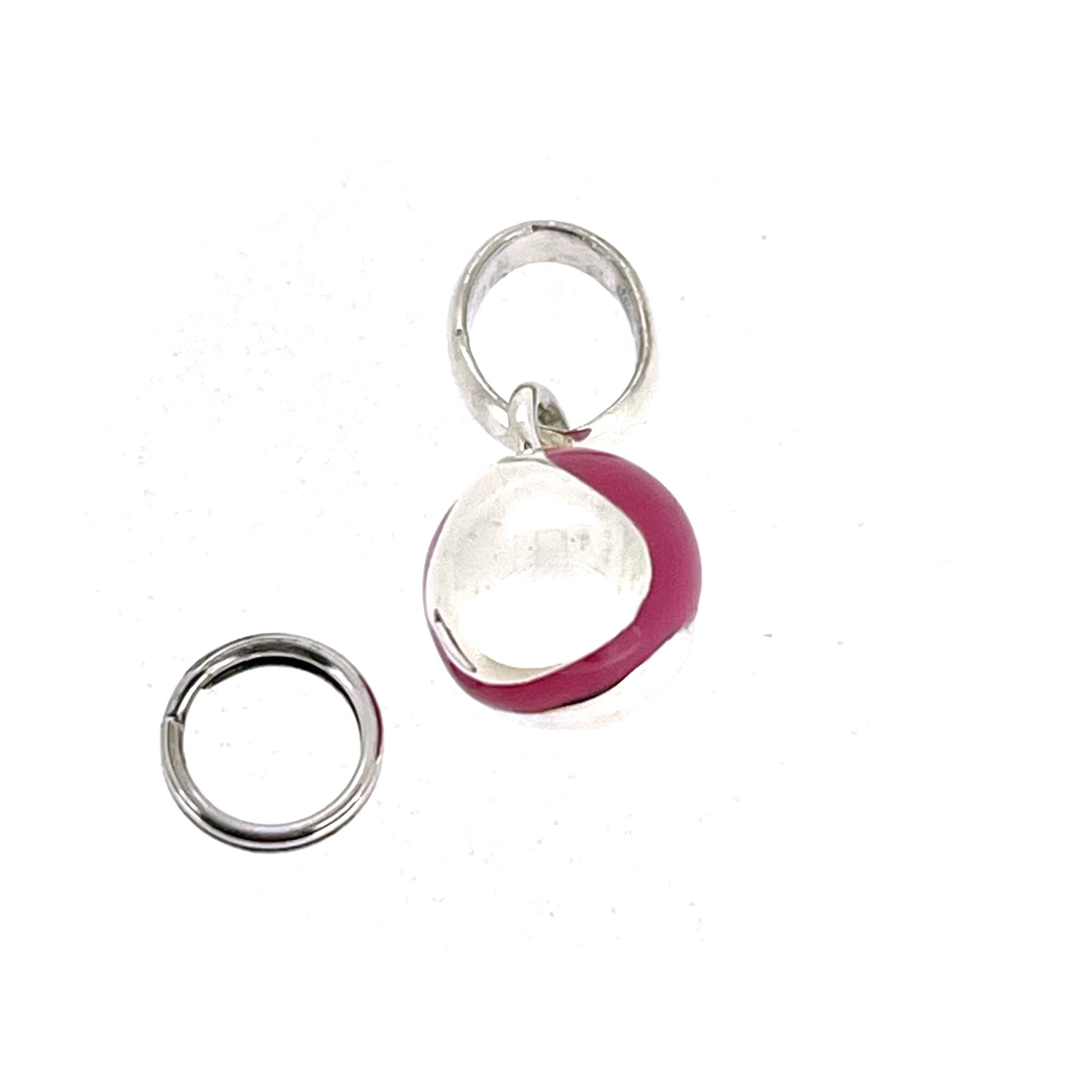 Links of London tennis ball charm in sterling silver with pink enamel