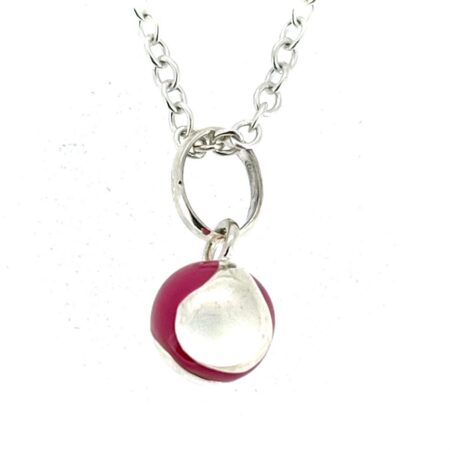 Small pink enamel tennis ball necklace front view