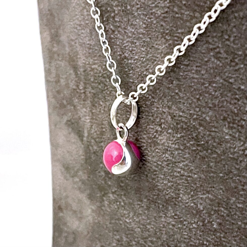 Vintage sterling silver tennis ball necklace with pink enamel