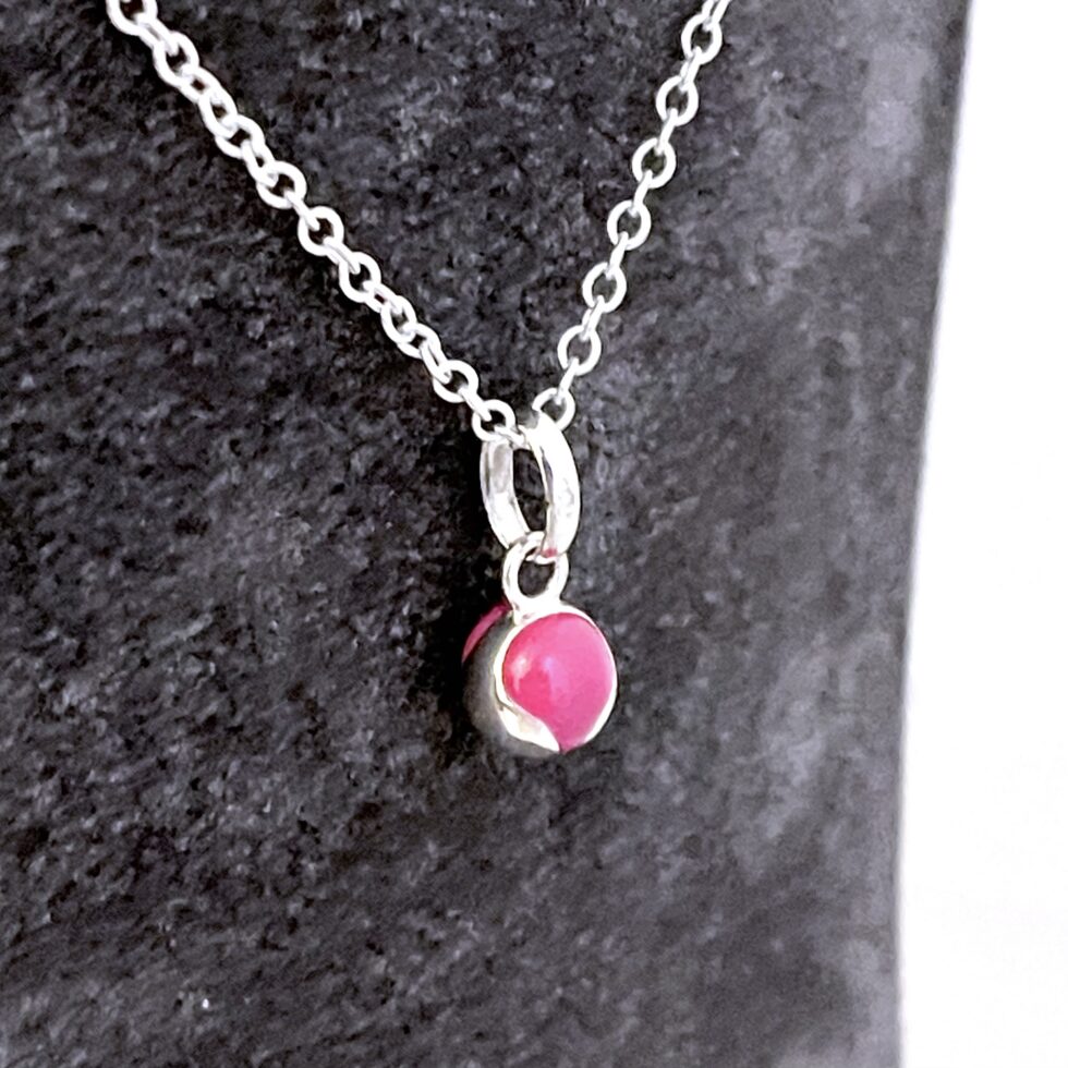 Tennis ball charm presented as a finished Links of London necklace