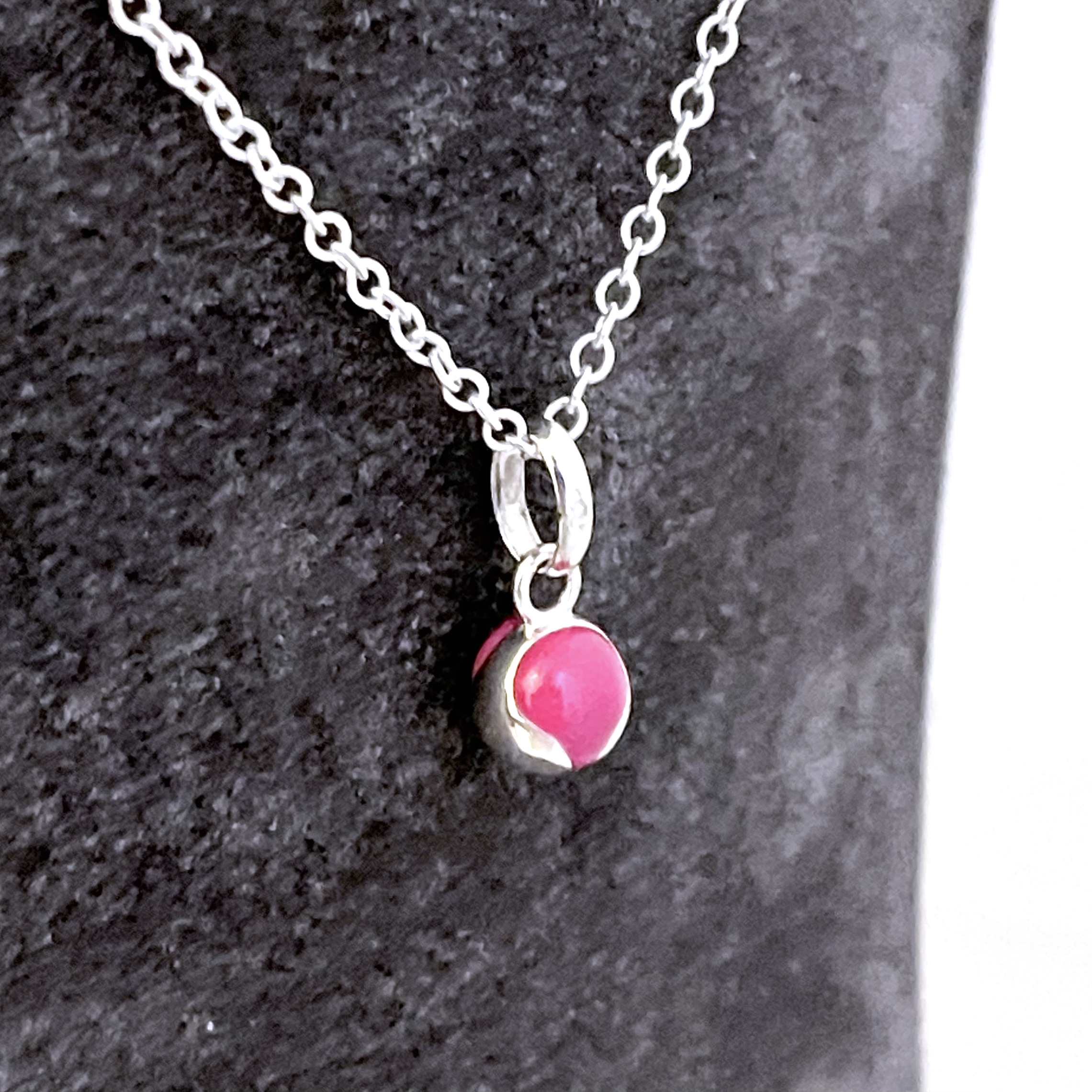 Tennis ball charm presented as a finished Links of London necklace