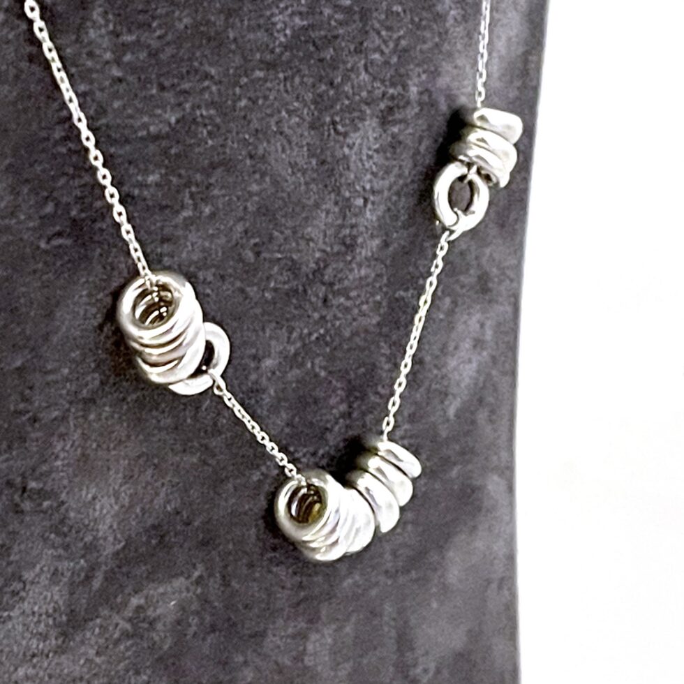 Vintage sterling silver Sweetie Links necklace with central grouped detail