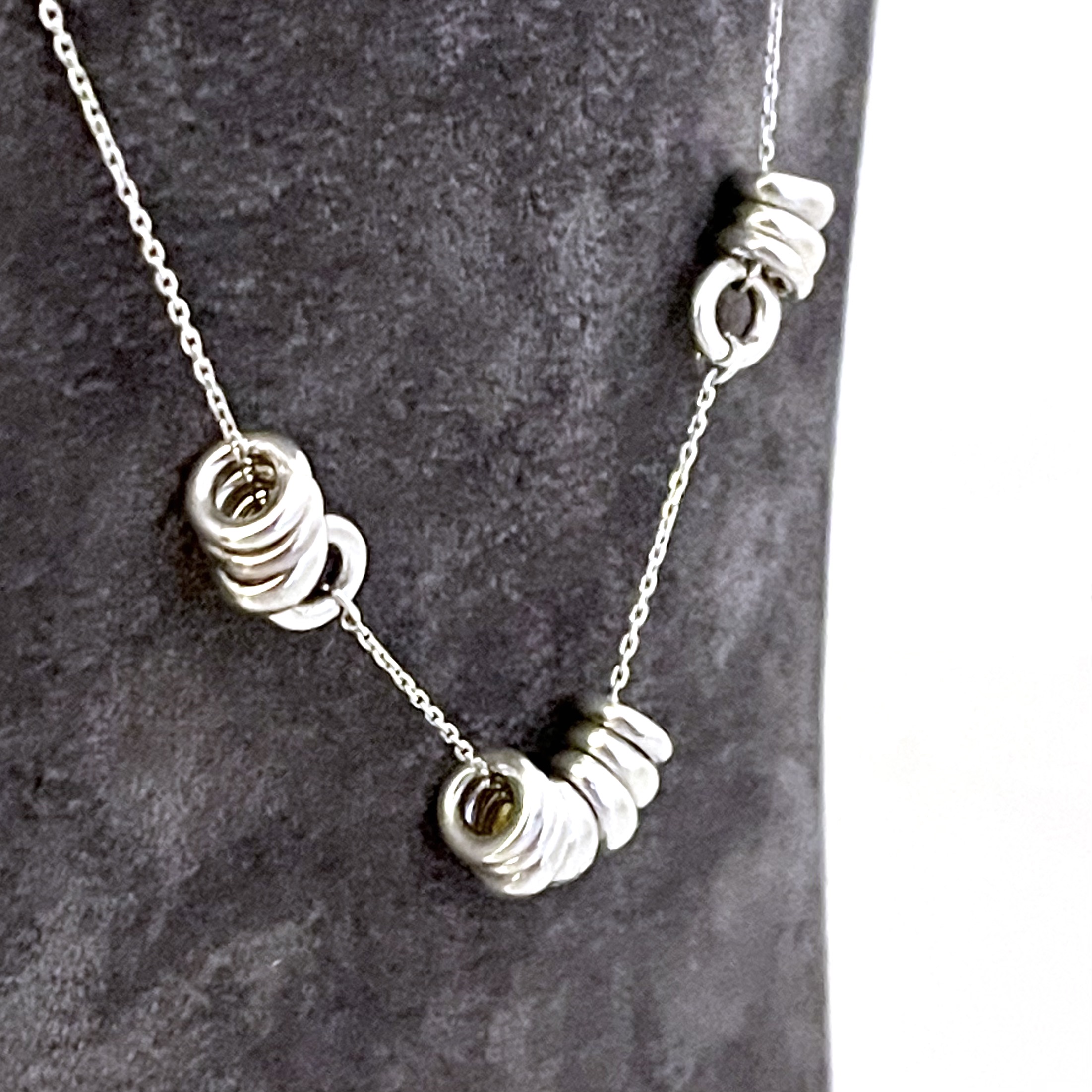 Vintage sterling silver Sweetie Links necklace with central grouped detail