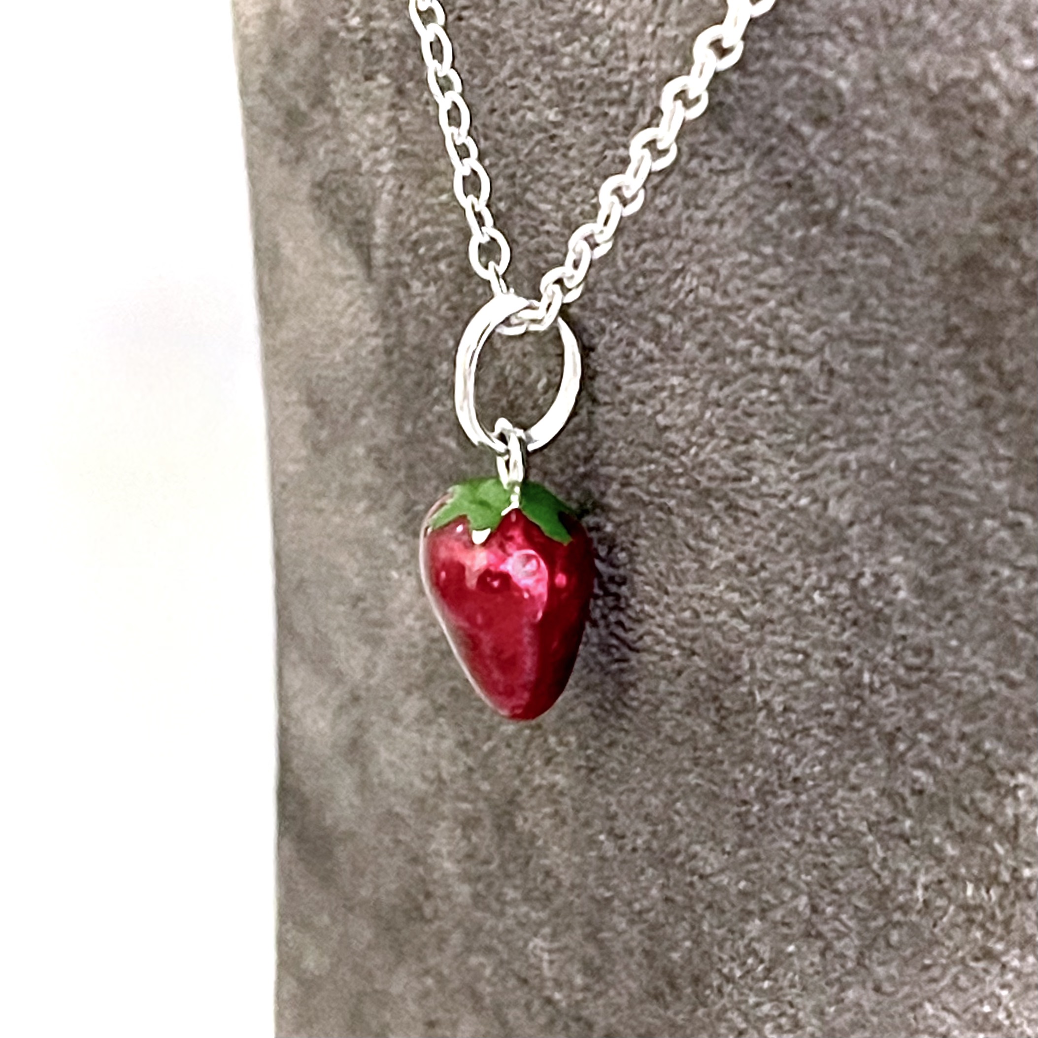 Strawberry charm presented as a finished Links of London necklace