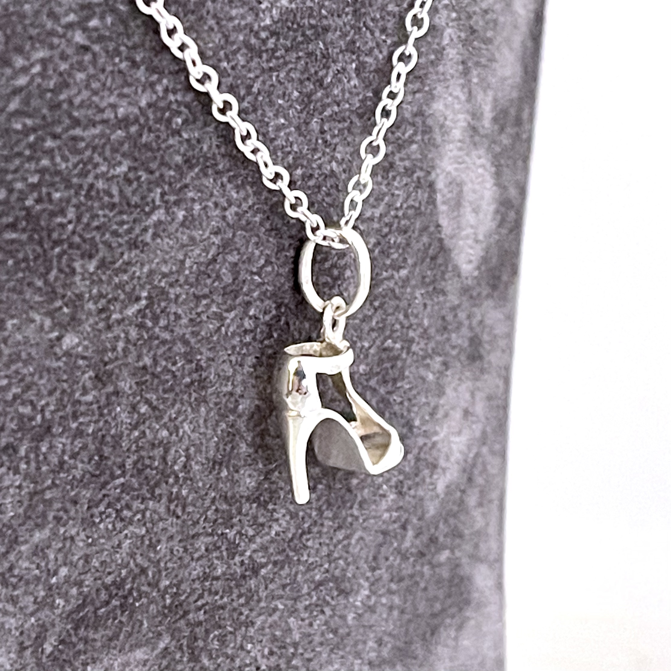 Vintage sterling silver T-Strap heel necklace with polished finish